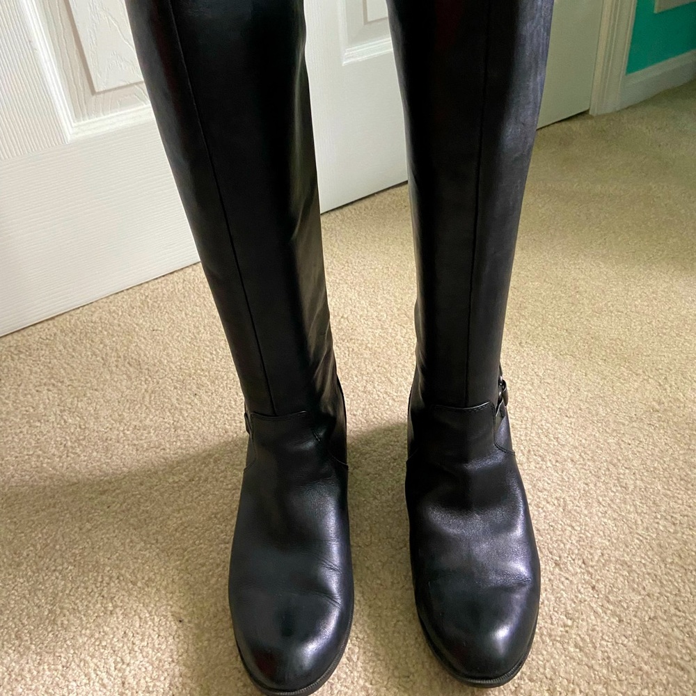 Black knee-high boots.